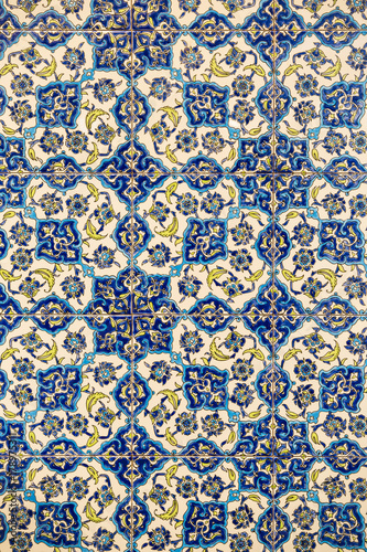 flower patterns on ceramic tiles in the old Turkish style  detail of an Izmir-style patterned wall tile  texture of tiles turkey