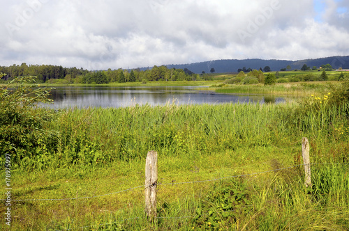 Beautiful natural landscape of Abbey Lake in Jura, France photo