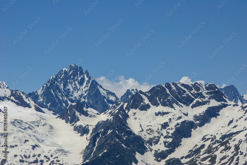 Mountain landscapes and summits on a sunny day.