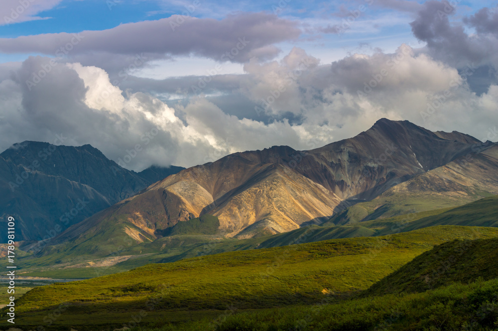 Alaska Range of Mountains with a braided river in the valley below. Denali National Park, Alaska