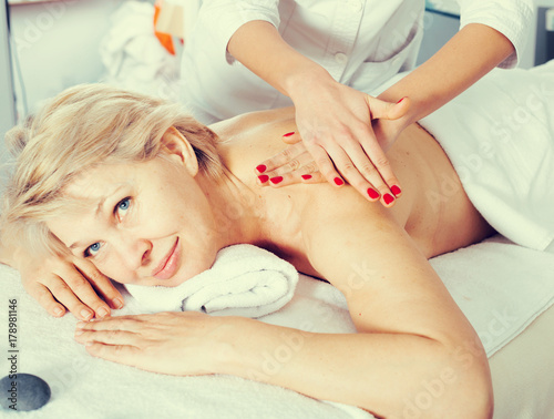 Mature woman having massage