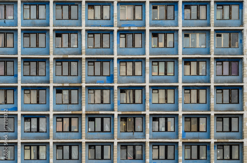 Facade of an old high-rise building. Urbanization concept © v_sot