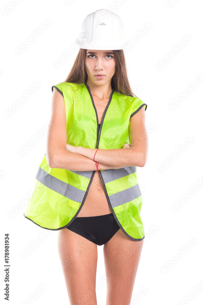 studio portrait of a girl in a bathing suit and a yellow construction vest studio portrait of a girl in a bathing suit and a yellow construction vest