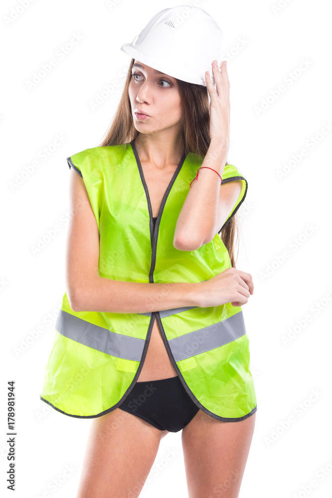 beauty brunette young woman in builder outfit and black bikini beauty brunette young woman in builder outfit and black bikini