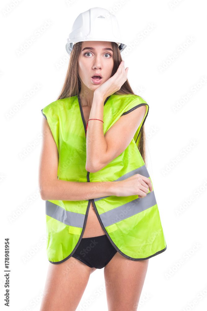 beauty brunette young woman in builder outfit and black bikini