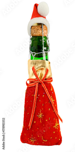 Santa Claus red hat on Champagne Bottle in SantaBag, Christmas decoration present photo