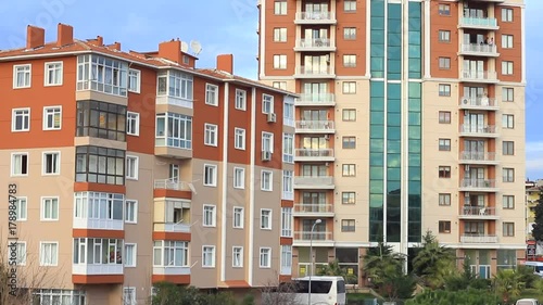 Apartment building. Multistored modern and stylish living block of flats. photo