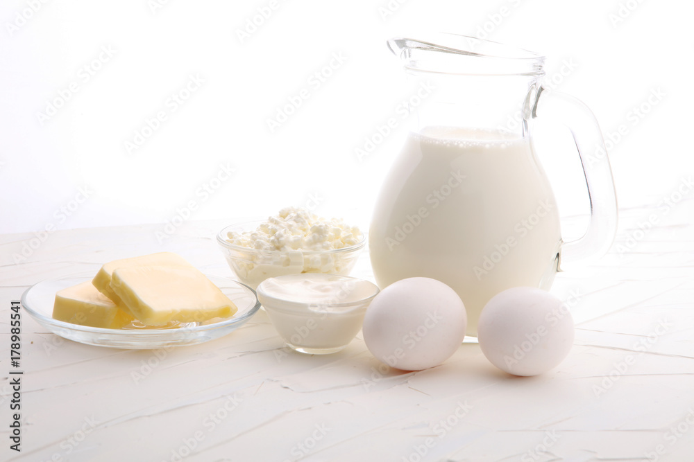 still life with dairy products, milk, eggs, butter with a lot of calcium. still life with dairy products, milk, eggs, butter with a lot of calcium.