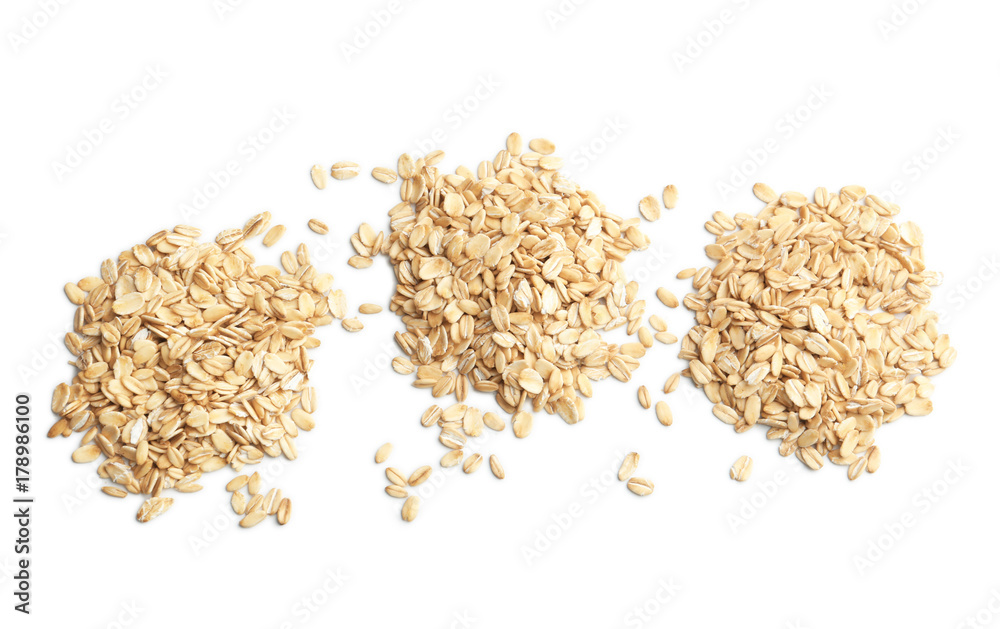 Raw oatmeal on white background Raw oatmeal on white background