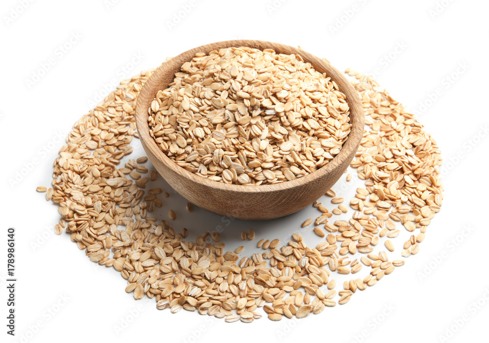 Bowl with raw oatmeal on white background Bowl with raw oatmeal on white background