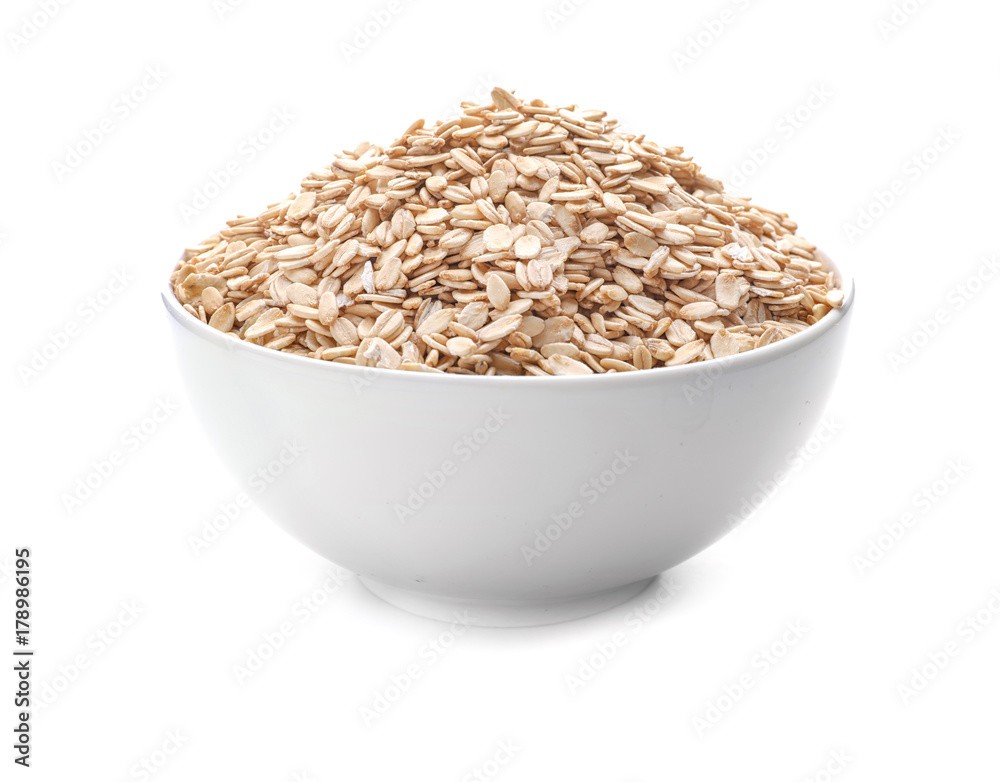 Bowl with raw oatmeal on white background Bowl with raw oatmeal on white background