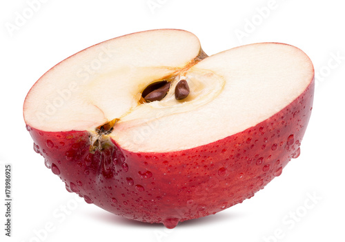 half of red apple in water drops isolated on a white background