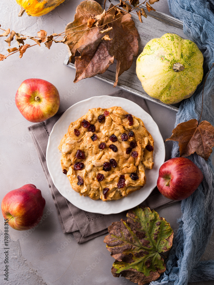 Apple pie with dried cranberries. Autumn baking with apples