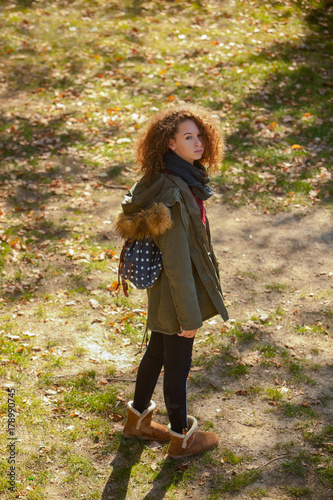 Teen girl in autumn forest