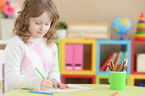  girl drawing at home