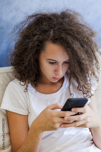 Teen girl with mobile phone