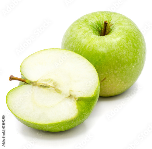 One whole apple Granny Smith and a half isolated on white background 