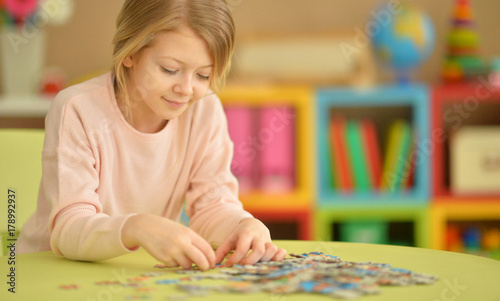 girl collecting puzzles