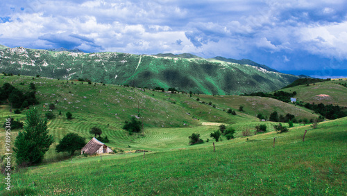 Fields, meadows, mountains, roads. Balkans. An aerial top-view