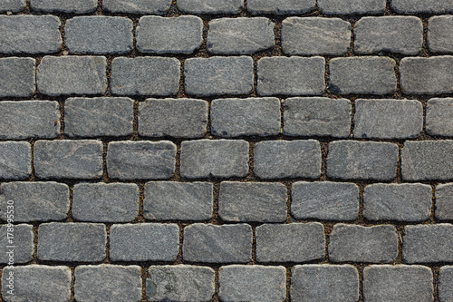 Fotografija Overhead view of cobblestone street texture