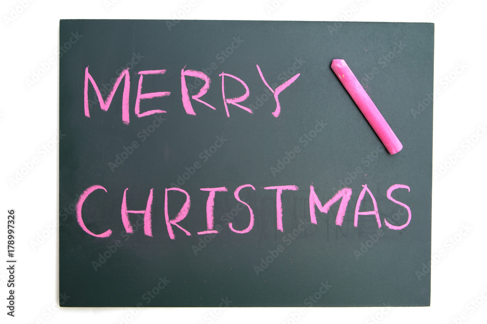 Merry Christmas with red chalk on blackboard Merry Christmas with red chalk on blackboard