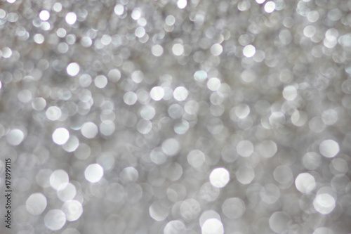 Glitter silver white bokeh abstract background