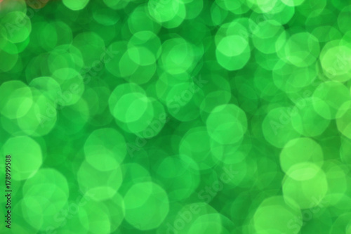Glitter green bokeh background