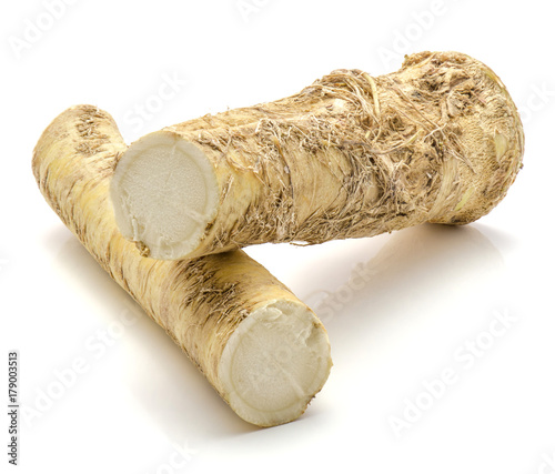 Fresh horseradish root isolated on white background two halves