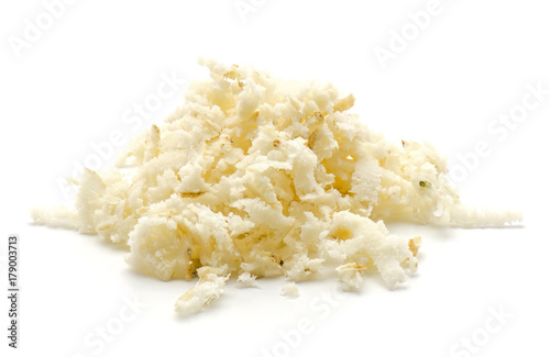 Photos Freshly grated mash of horseradish root isolated on white background