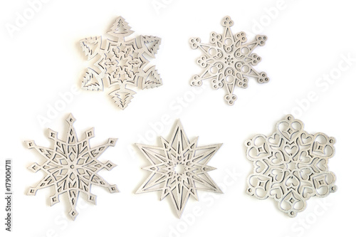 Silver snowflakes ornaments isolated on white background. Set of five different silver snowflakes.