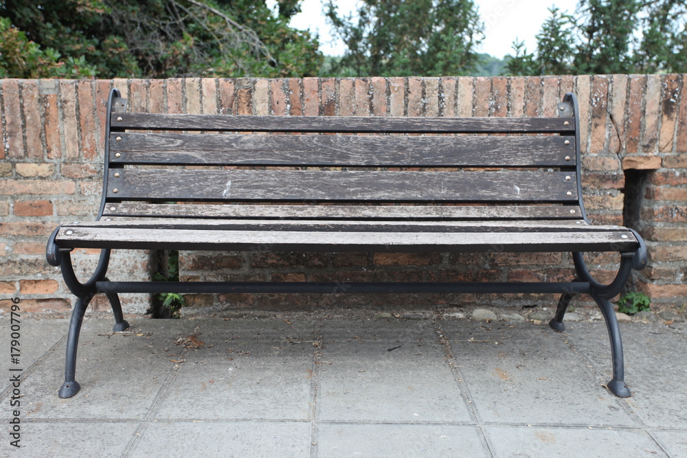 An old bench in a typical Italian square