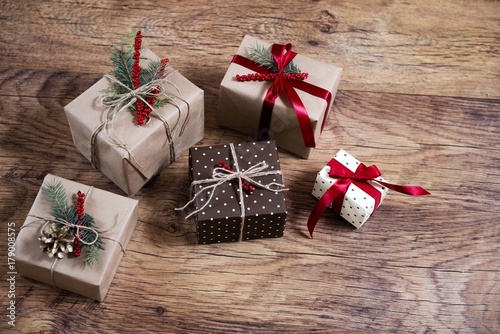 christmas gifts on wooden table