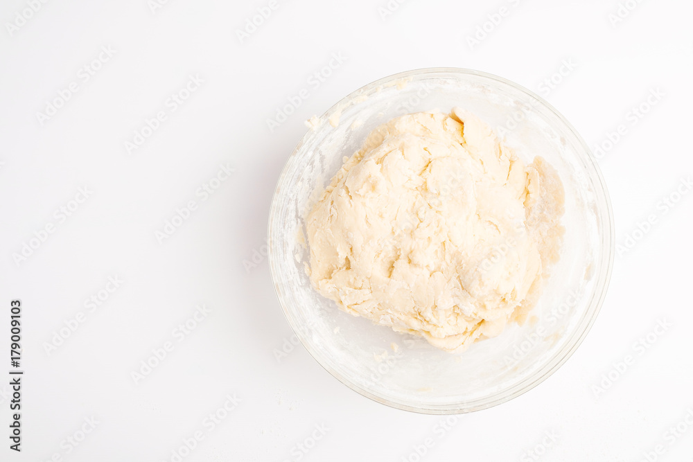 dough for baking cookies on a white table