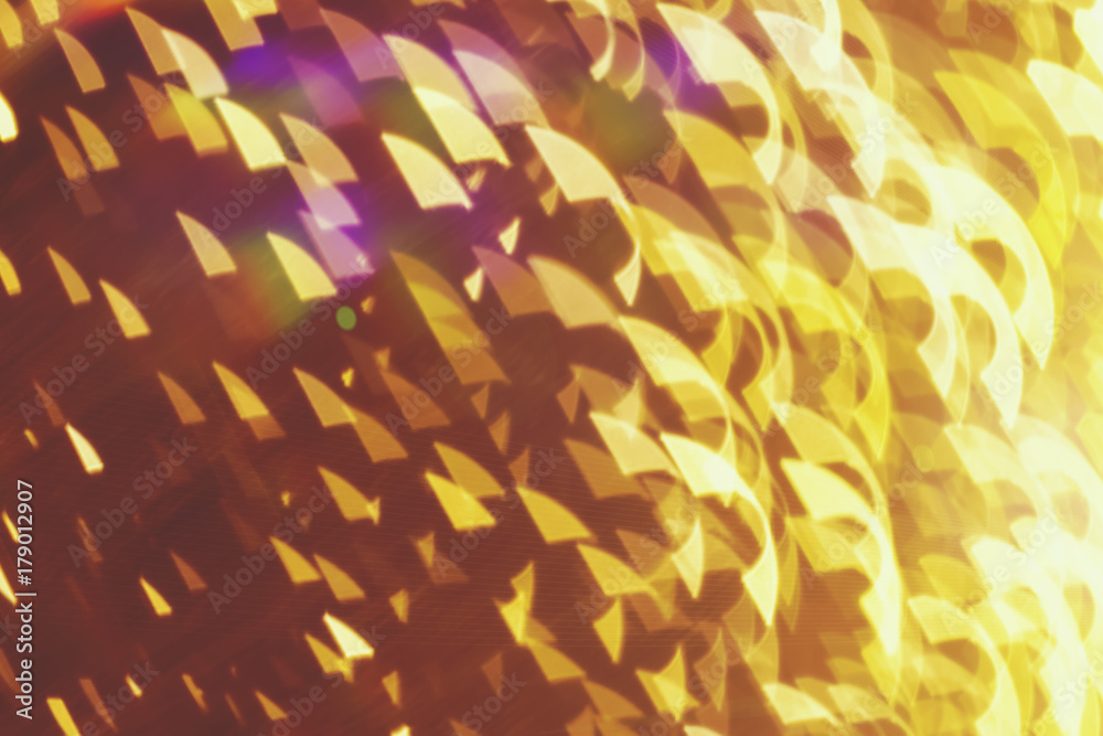 Abstract xmas Gold sparkles or glitter lights. Christmas festive gold background. Defocused bokeh particles. Template for design Abstract xmas Gold sparkles or glitter lights. Christmas festive gold background. Defocused bokeh particles. Template for design