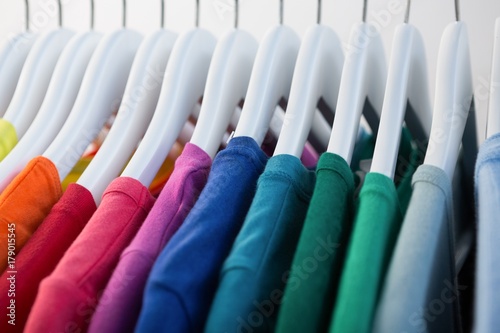 Colorful t-shirts arranged in a row