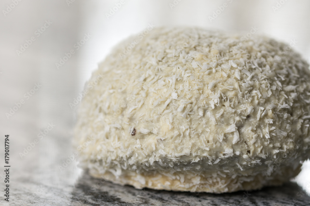 Coconut cookie with chocolate on the grey granite background table