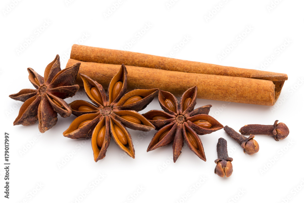 Cloves, anise and cinnamon isolated on white background. Cloves, anise and cinnamon isolated on white background.