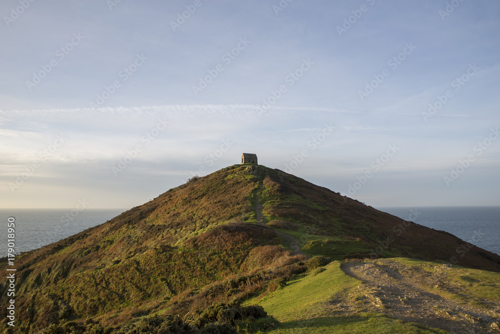 Old ancient Chapel on Rame head Peninsula with blue sky , Cornwall, UK