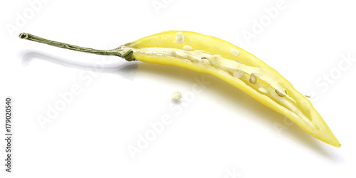 Yellow Chili pepper, one half, isolated on white background