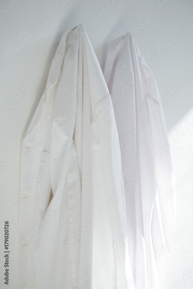 Fototapeta premium Shirts hanging on wall