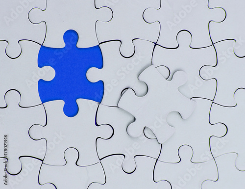 business white puzzle concept. one pice blue