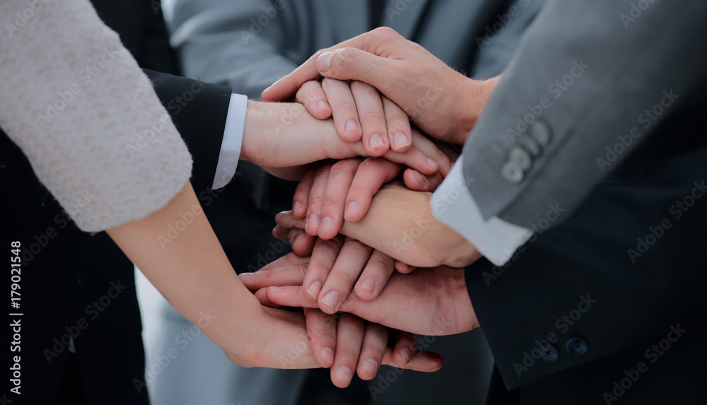 concept of confidence in each other: business team standing with concept of confidence in each other: business team standing with