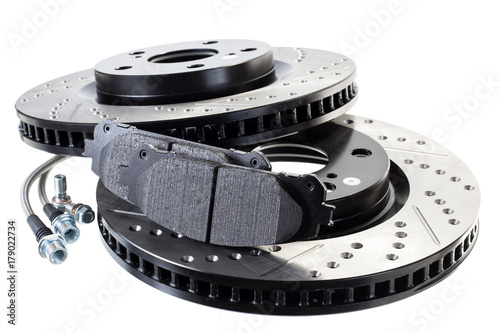 brake disc, pad and reinforced brake hose on a white background
