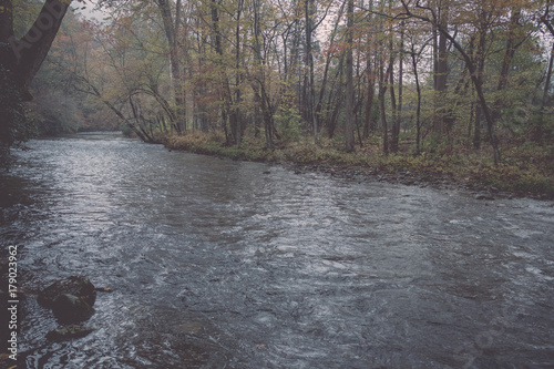 Oconaluftee River in Smoky Mountain National Park during the fall photo