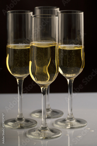 four Champagne glasses