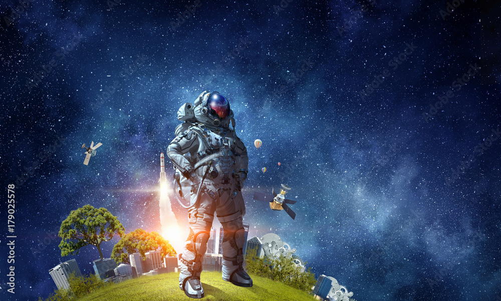 Fototapeta Space fantasy image with astronaut. Mixed media