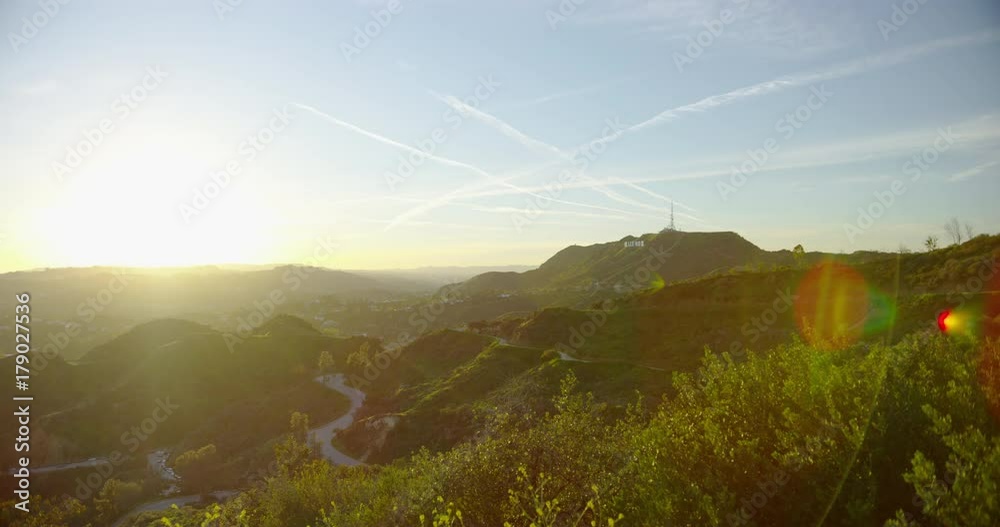The famous Hollywood Sign at sunset in Los Angeles, California.
