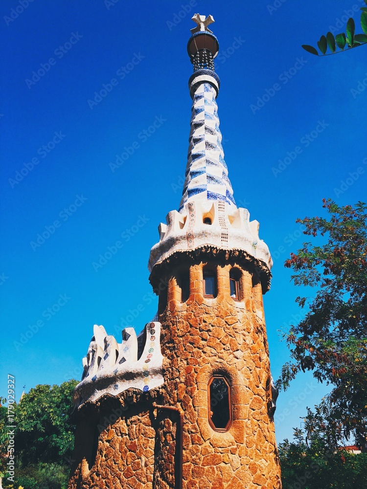 Fragments of the beautiful architecture in Park Guell. Parc Guell designed by Antoni Gaudi, is one of the world's most intriguing parks. Carmel Hill, Barcelona, Spain.