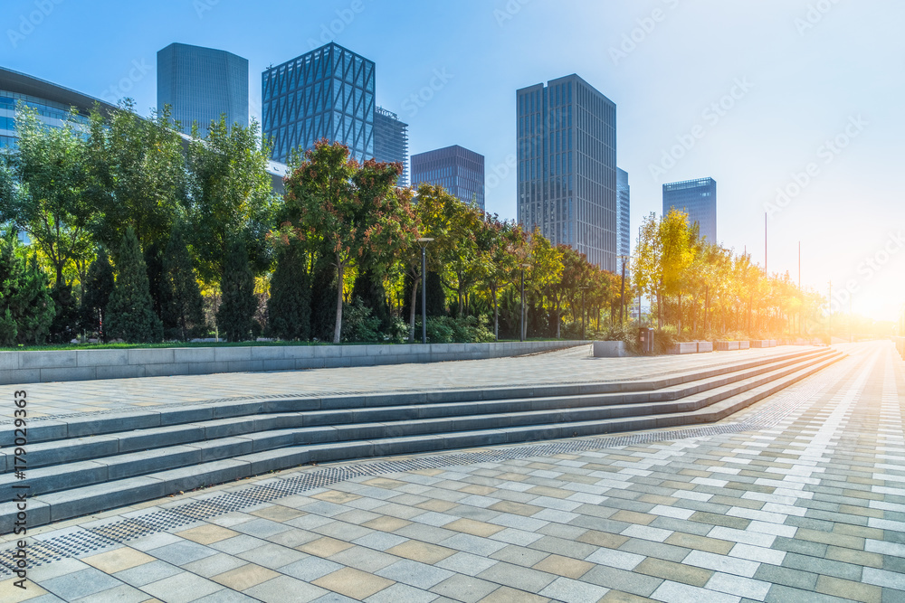 Obraz premium modern buildings and empty pavement in china..
