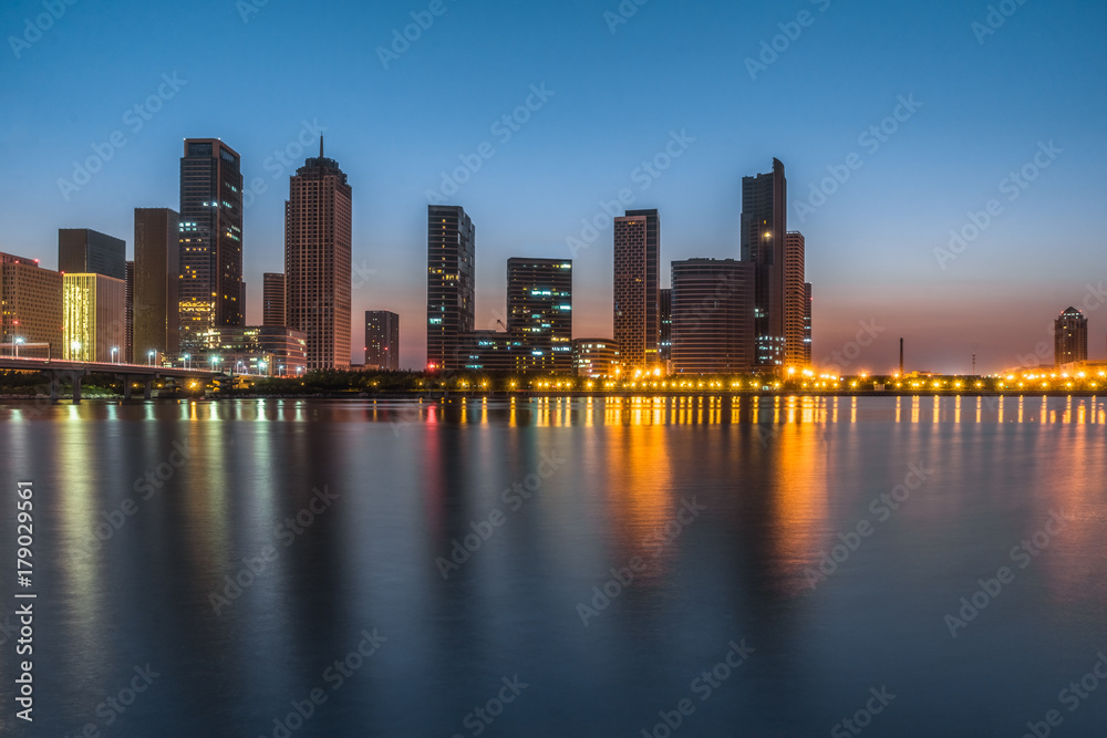 Tianjin city waterfront downtown skyline at dusk,China. Tianjin city waterfront downtown skyline at dusk,China.